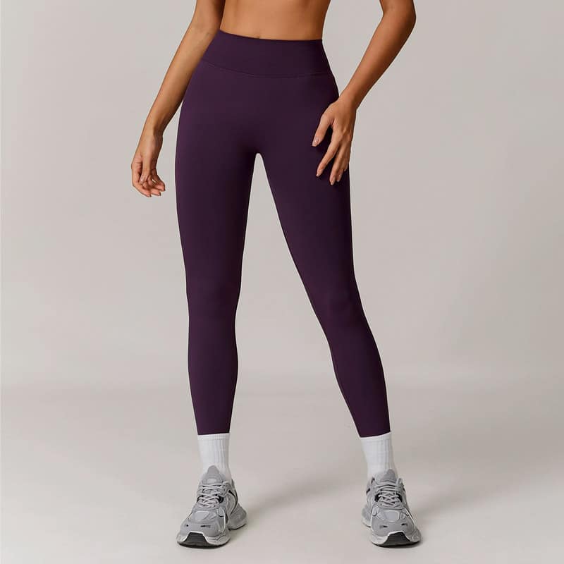 Form-fitting seamless performance leggings crafted with 4-way stretch sweat-wick synthetic knit, zero side-seam construction for all-day workout comfort.