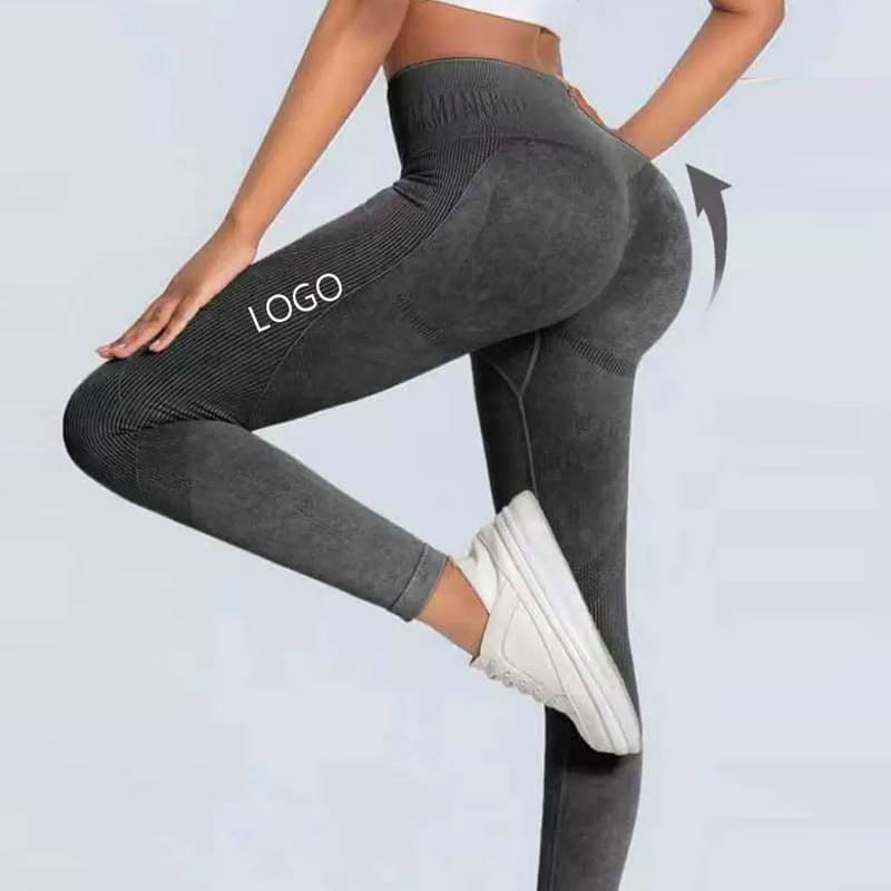 Wholesale seamless leggings with custom writing down the leg and engineered jacquard designs on the side