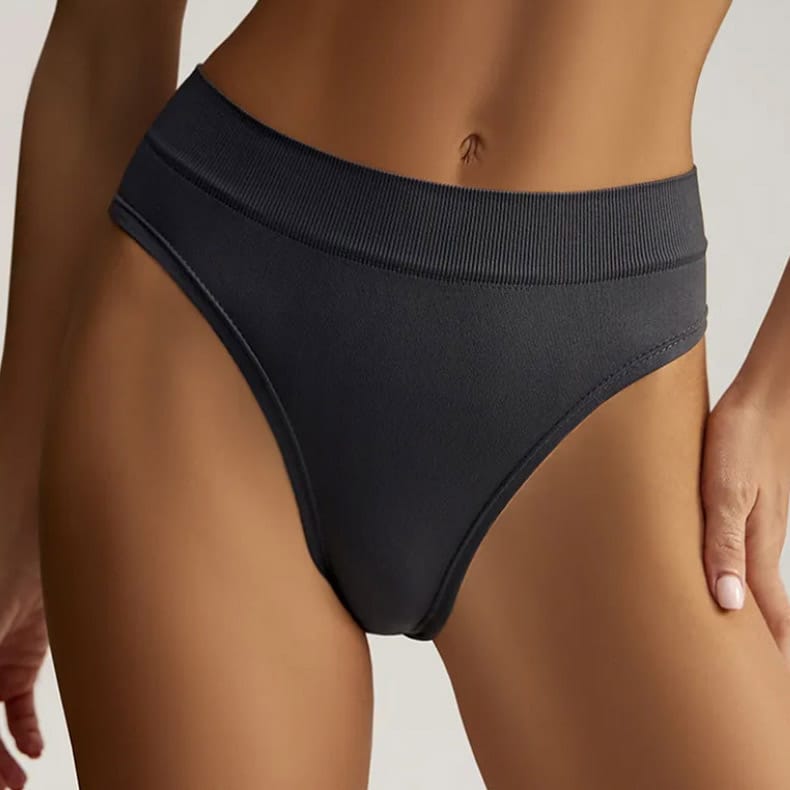 Close-up studio shot of womenโs dark grey bamboo fiber bikini panties, wide vertical rib non-roll waistband, seamless soft bamboo viscose knit fabric, breathable antibacterial moisture-wick construction, medium stretch fit for daily comfortable intimate wear, OEM private label sustainable underwear.